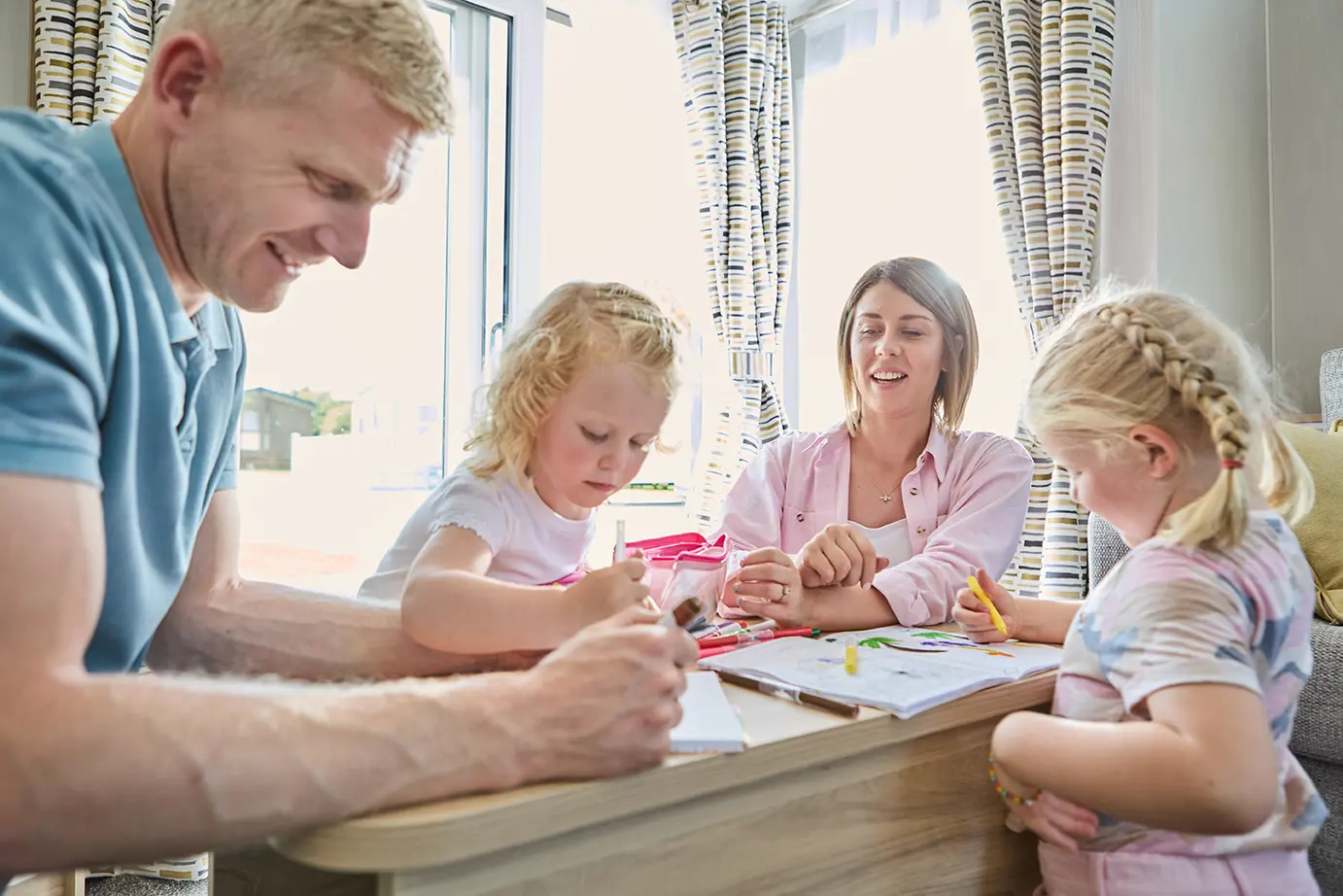 Young family enjoying a short caravan break in North Wales