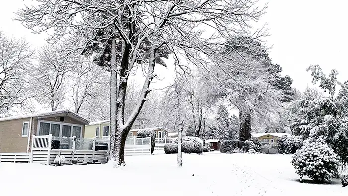 Snowy caravan holidays in at Woodlands Hall