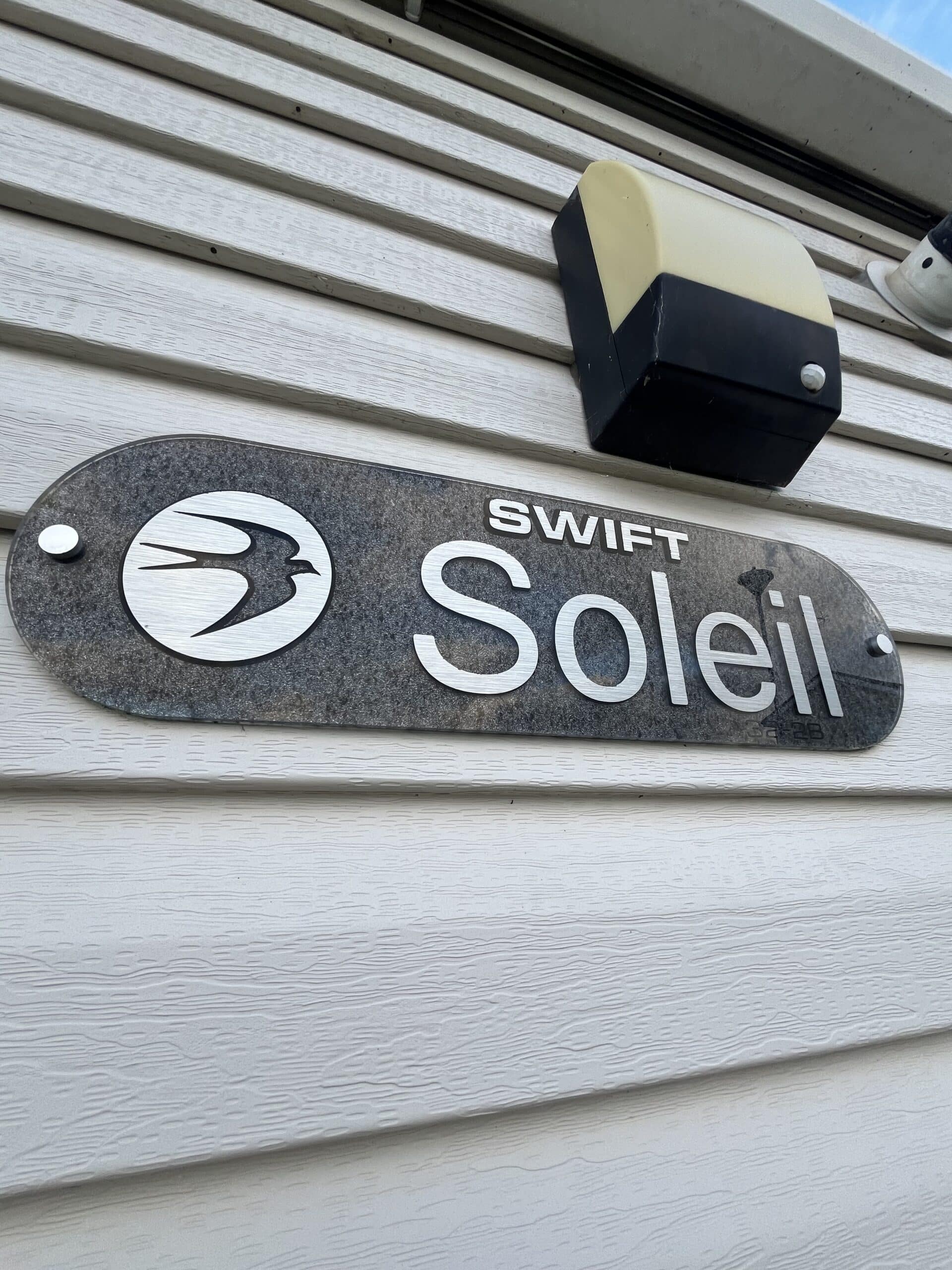 Soleil swift sign on caravan exterior
